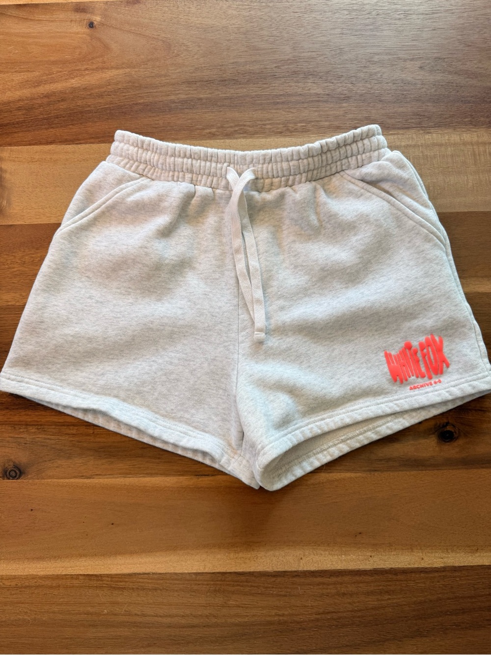 White Fox Boutique White Athletic Drawstring Shorts with Pink Logo